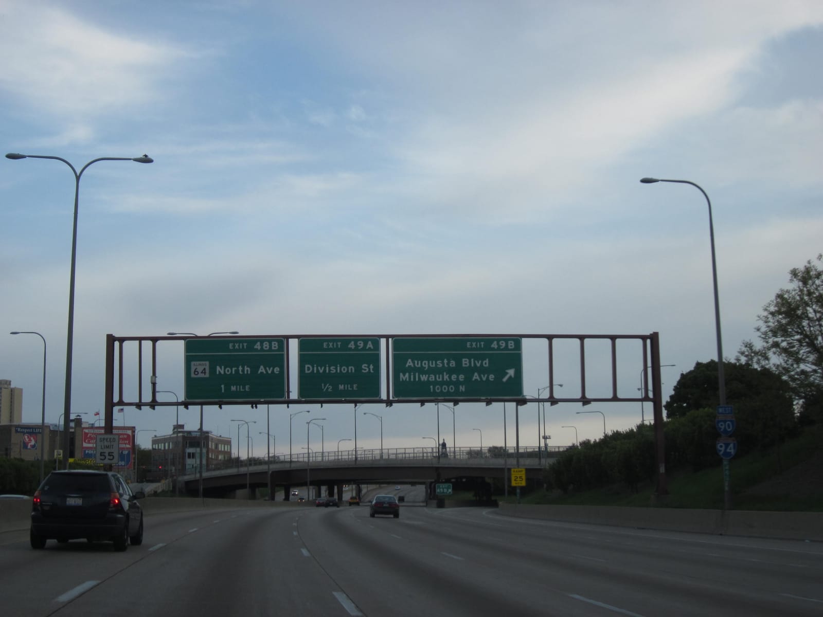 Interstate 90 in Illinois with overhead highway exit signs
