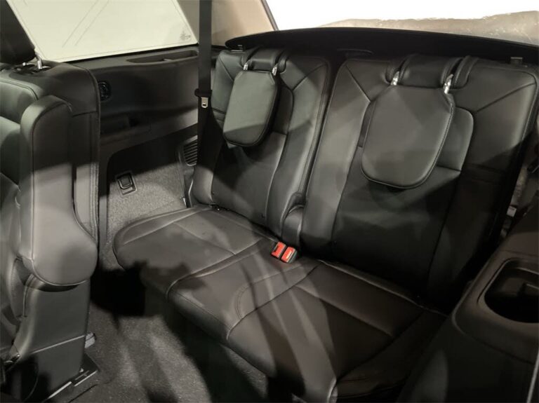 Third row of Black luxury Mid-Size SUV with leather interior for executive and airport transfers.