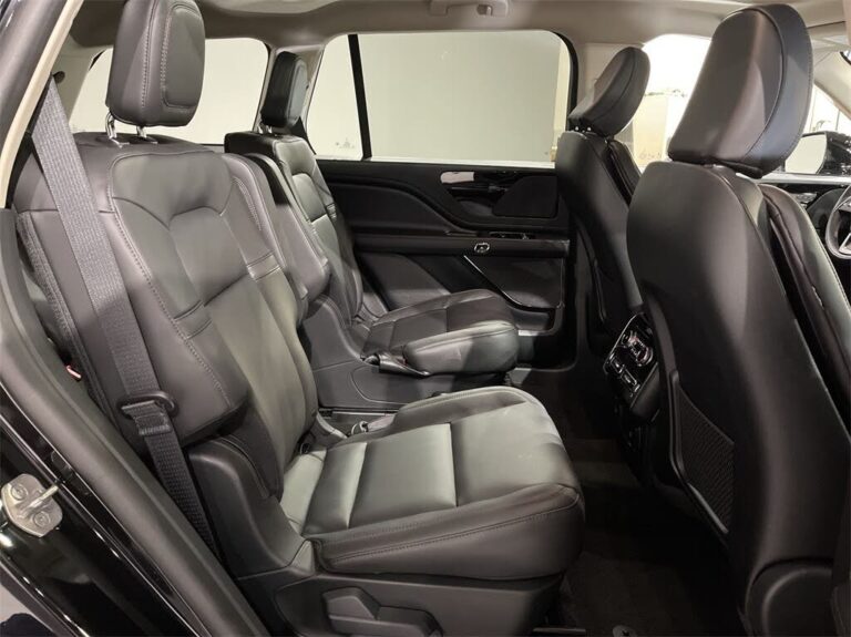 Black luxury Mid-Size SUV with leather interior for executive and airport transfers.